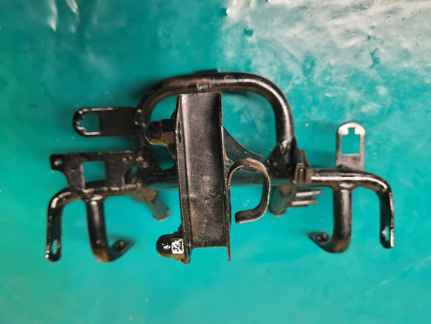 Araignée support phare 125 Honda transcity NX 1997