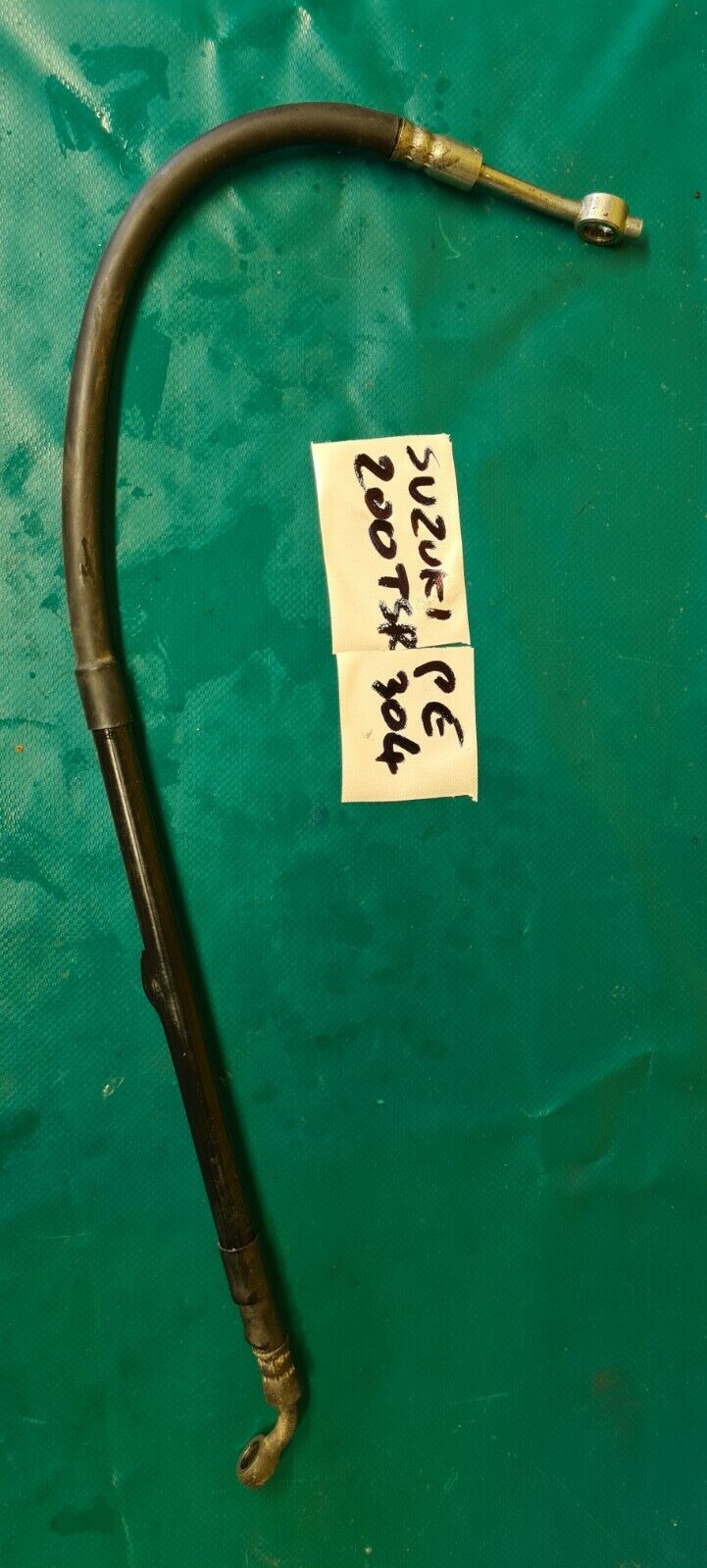Flexible de frein arriere Suzuki 200 TSR (code PE304)