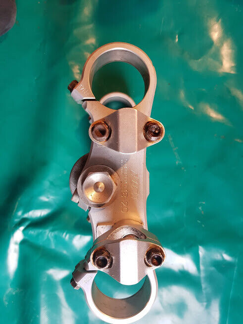 T de fourche d'origine avec pontets de guidon KTM 150 SX de 2010