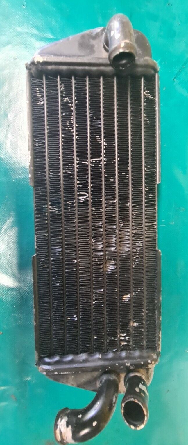 ratiateur cote sans bouchon KTM 250 EGS 1996 556