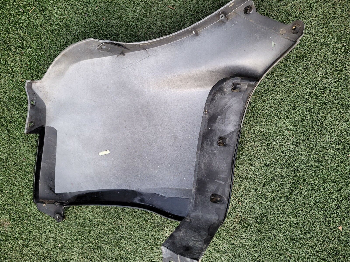 Cache plastique côté gauche 125 Honda transcity NX 1997