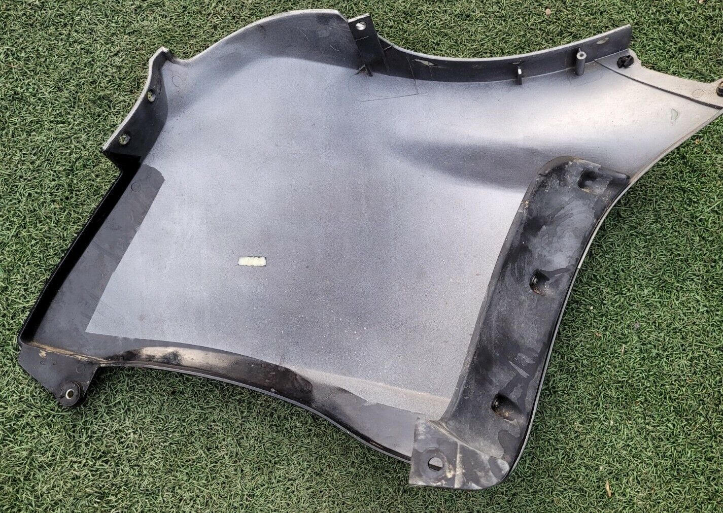 Cache plastique côté gauche 125 Honda transcity NX 1997
