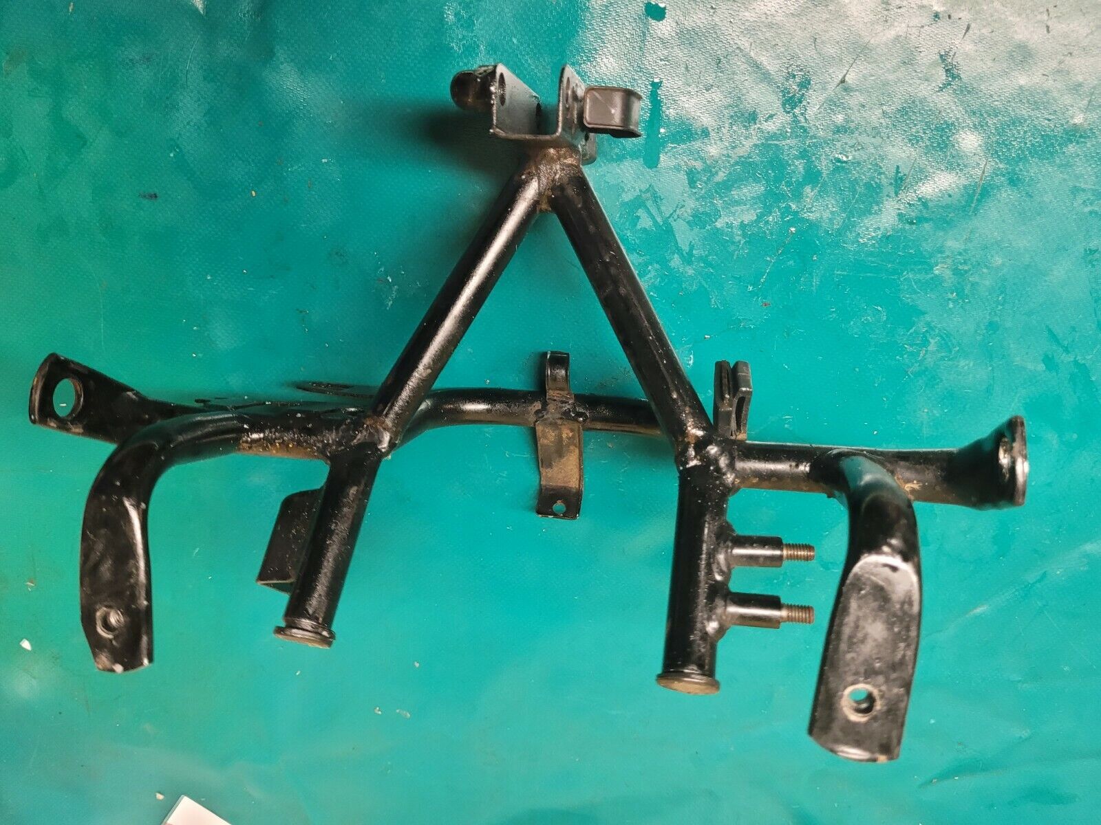 Araignée support phare  125 Honda transcity NX 1997