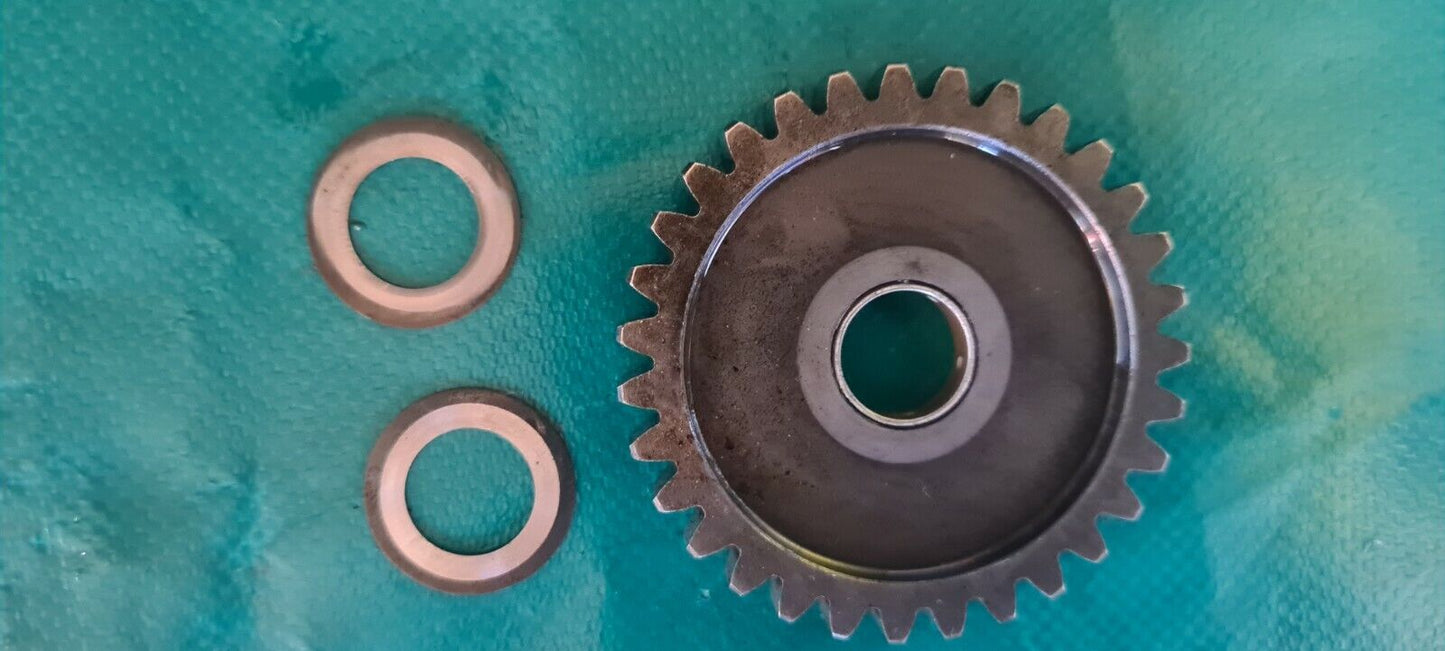 Engrenage entre  rocher de kick et cloche d'embrayage 125 kx Kawasaki 1987