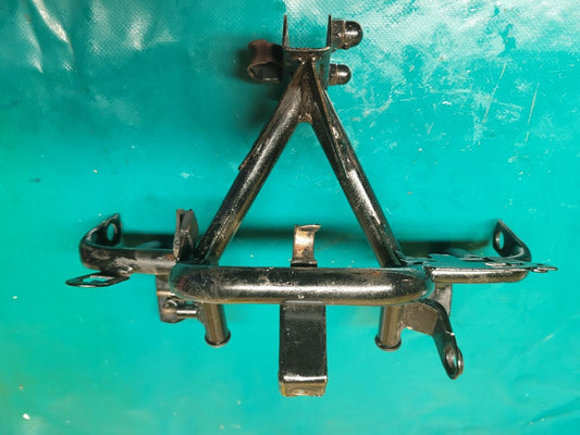 Araignée support phare  125 Honda transcity NX 1997